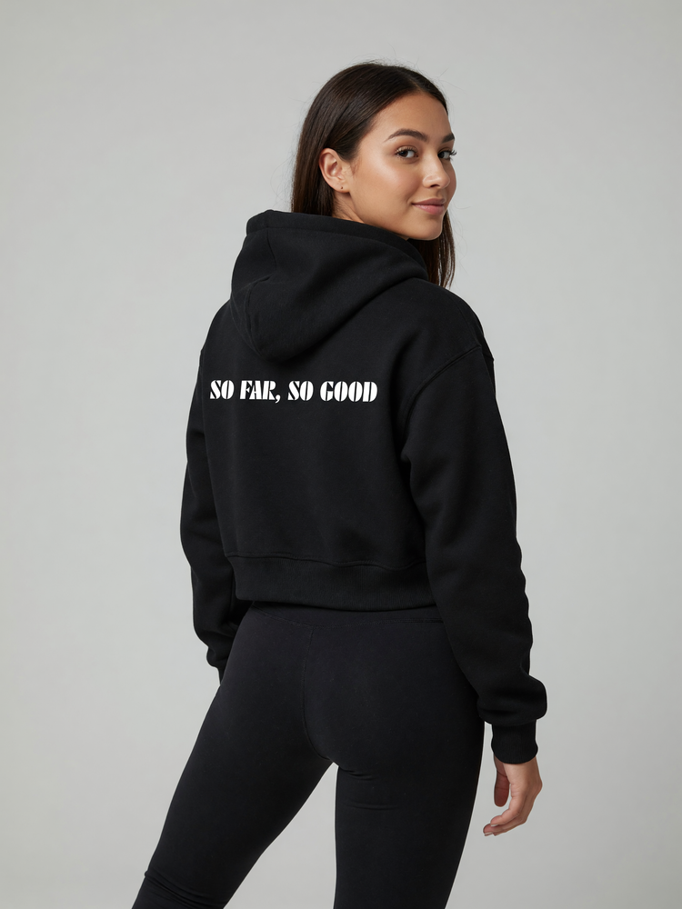 A model wearing the So Far, So Good Cropped Hoodie in Black