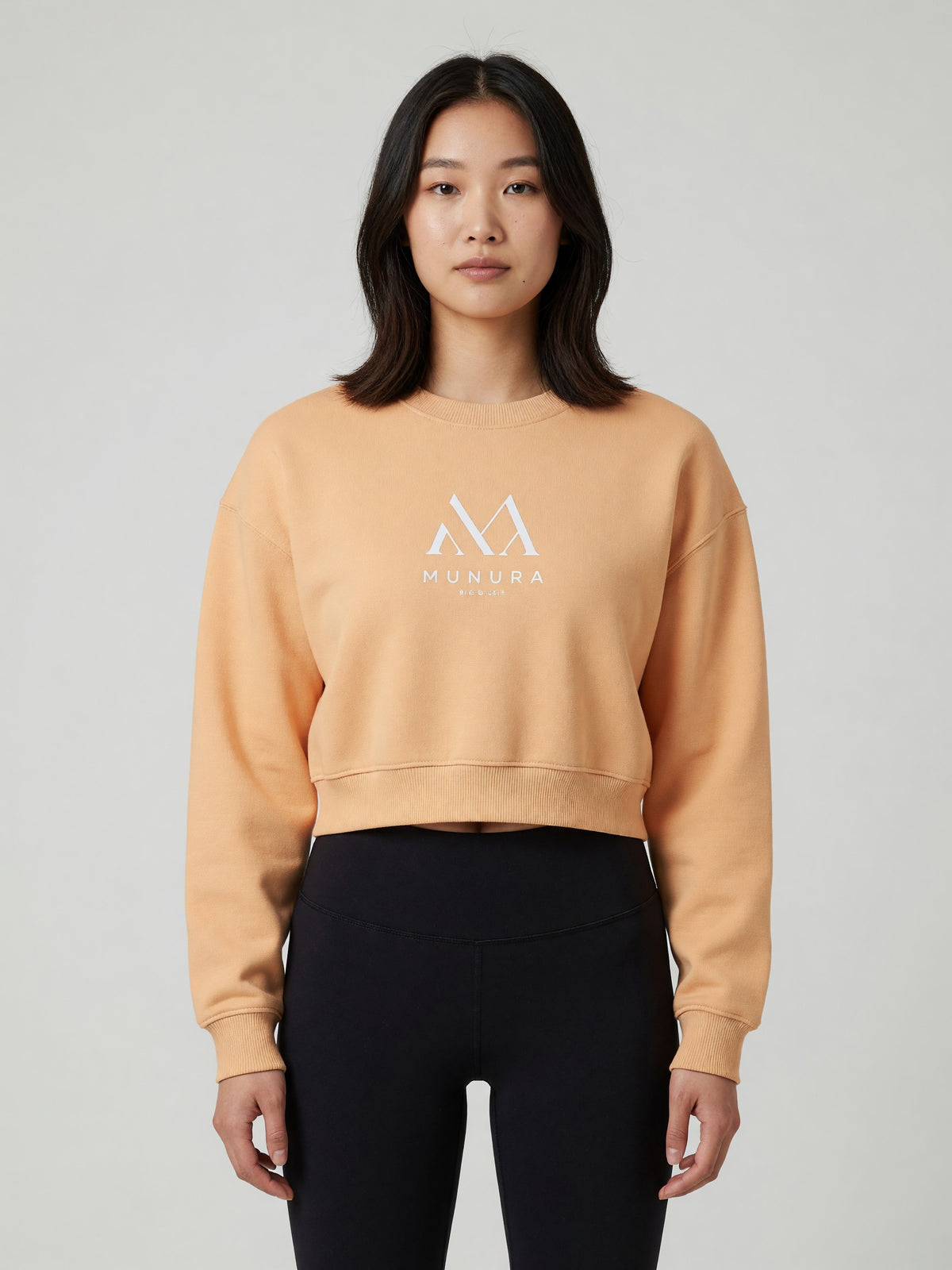 Cropped Crewneck Sweatshirt in Apricot, worn, front
