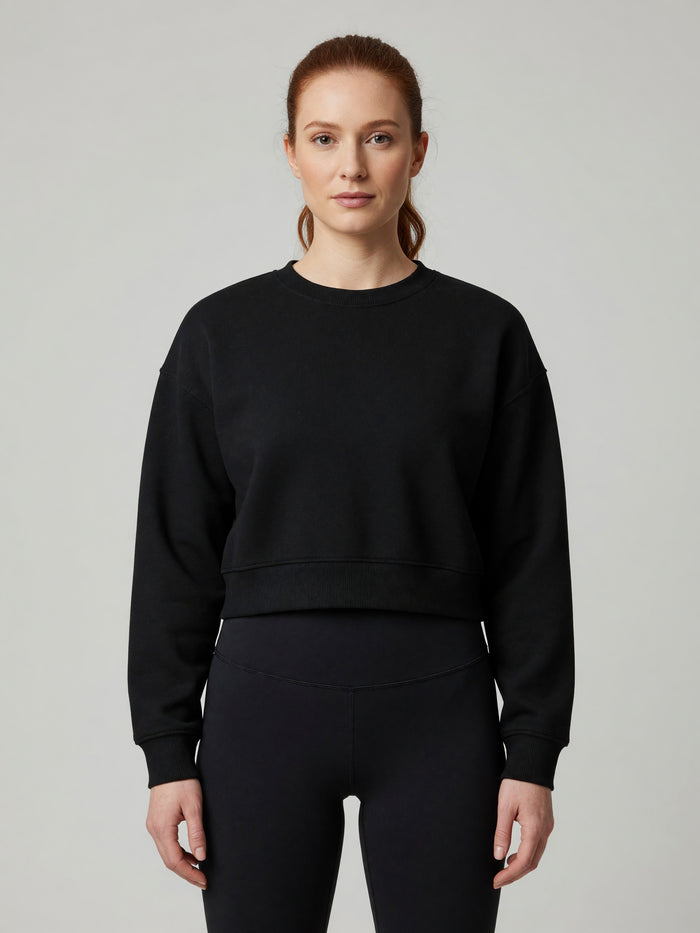 Cropped Crewneck Sweatshirt in Black, worn, front