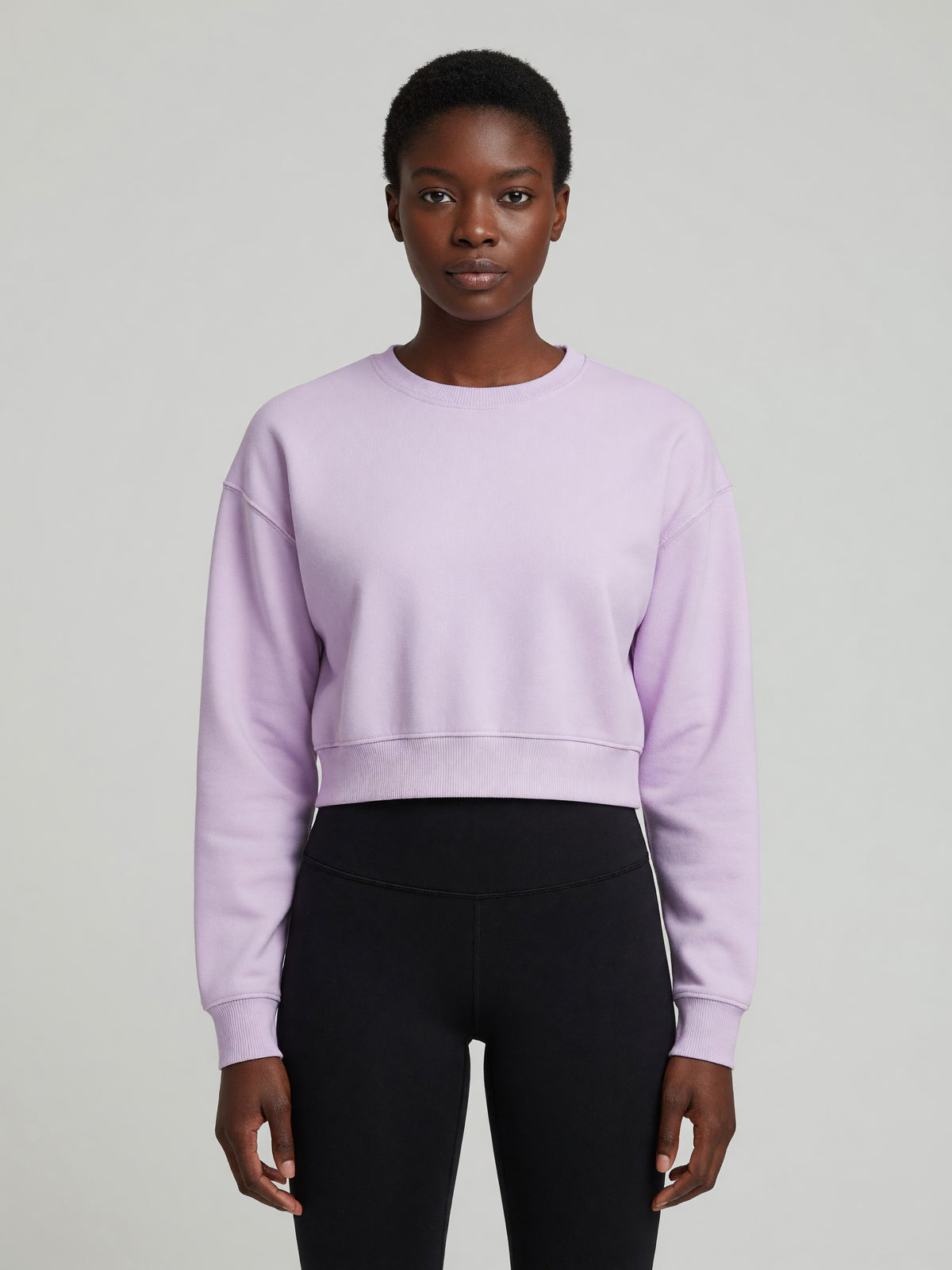 Cropped Crewneck Sweatshirt in Light Purple, worn, front