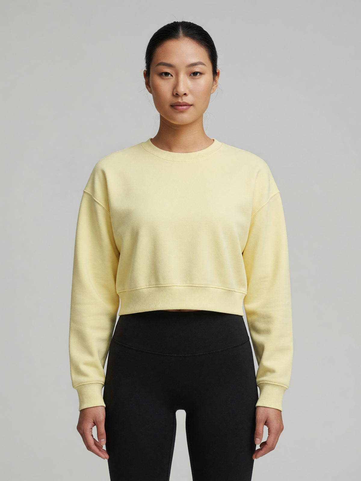 Cropped Crewneck Sweatshirt in Light Yellow, worn, front
