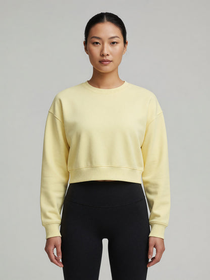 Cropped Crewneck Sweatshirt in Light Yellow, worn, front