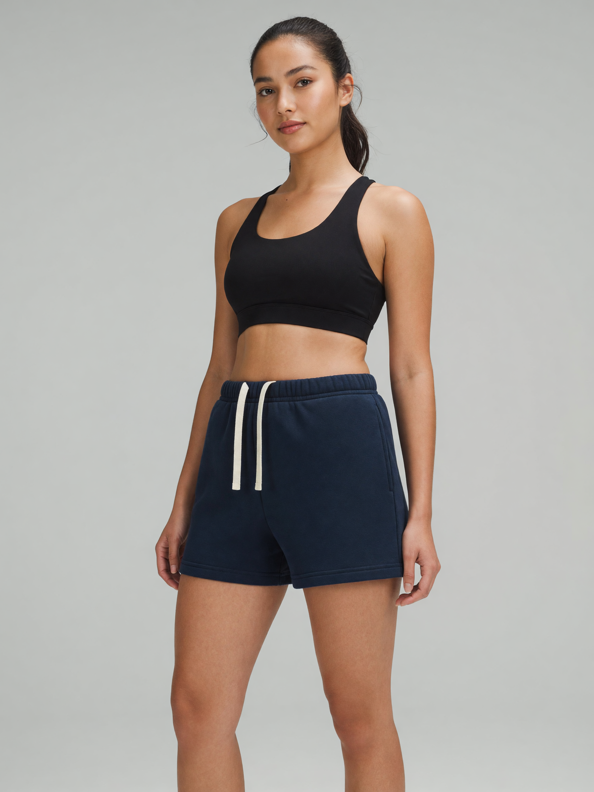 Drawstring Sweatshort in Navy Blue, worn, three-quarter