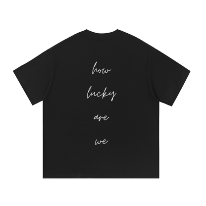 How Lucky Are We Tee in Black, back view
