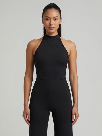 Halter Flare Jumpsuit in Black, worn, front
