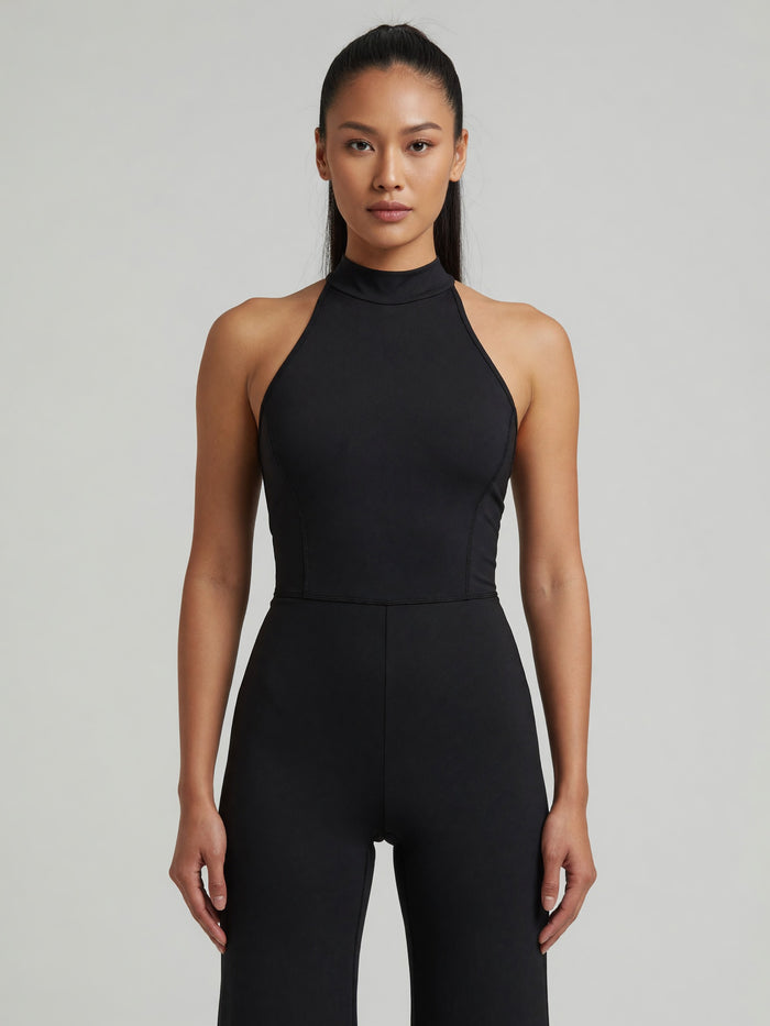 Halter Flare Jumpsuit in Black, worn, front