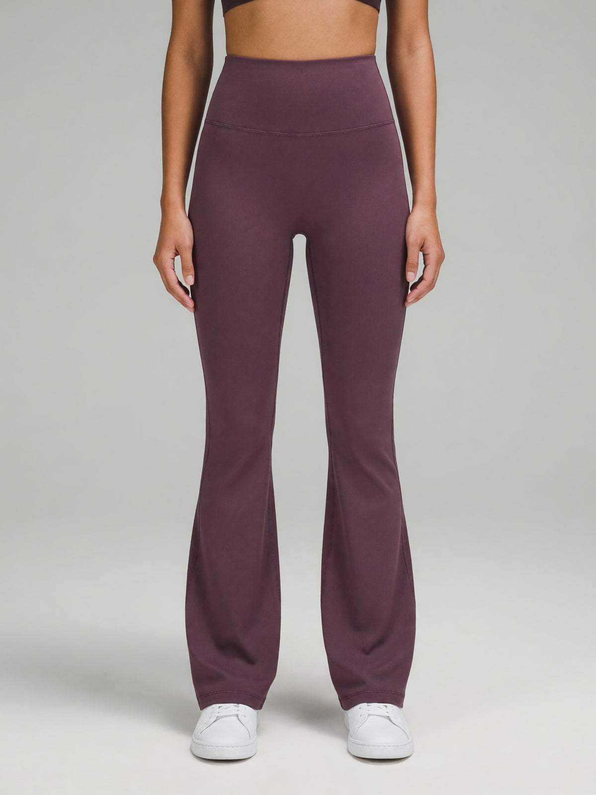 High-Rise Flare Legging in Plum Purple, worn, front