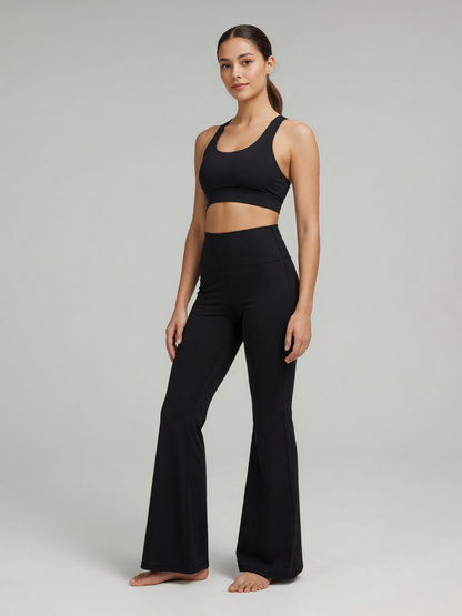 High-Rise Flare Legging in Black, worn, three-quarter