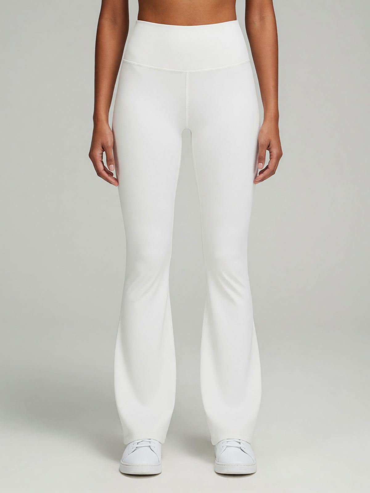 High-Rise Flare Legging in White, worn, front