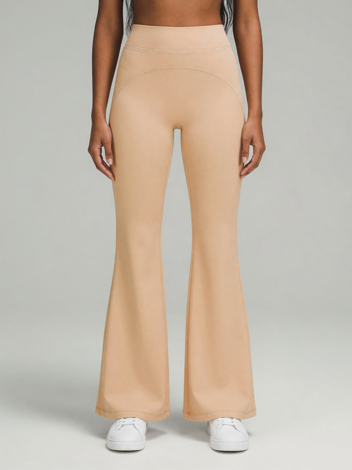 High-Rise Flare Pant in Light Apricot, worn, front