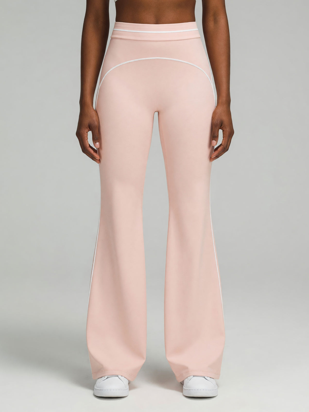 High-Rise Flare Pant in Light Pink, worn, front