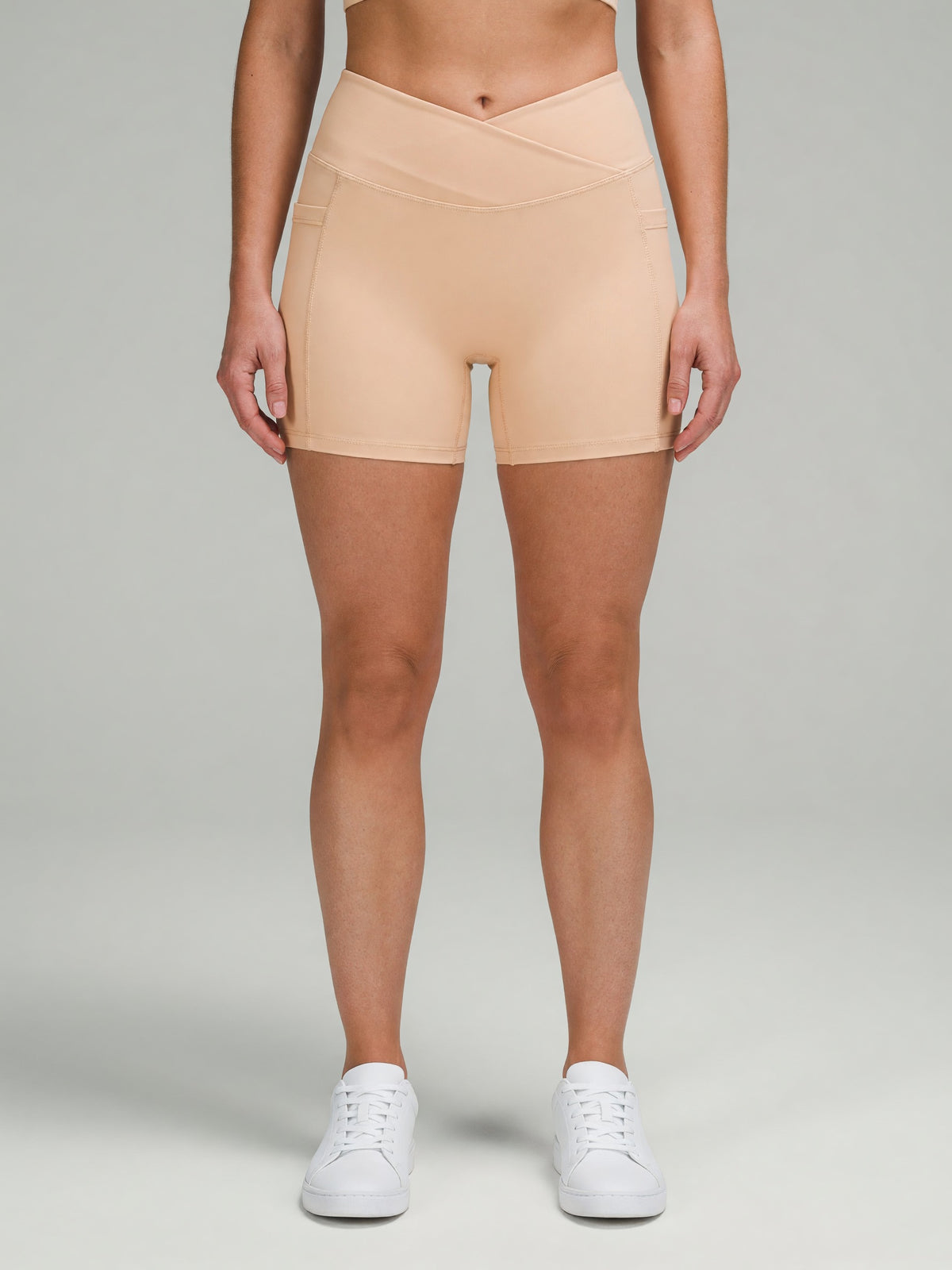 High-Rise Pocket Short in Light Apricot, worn, front