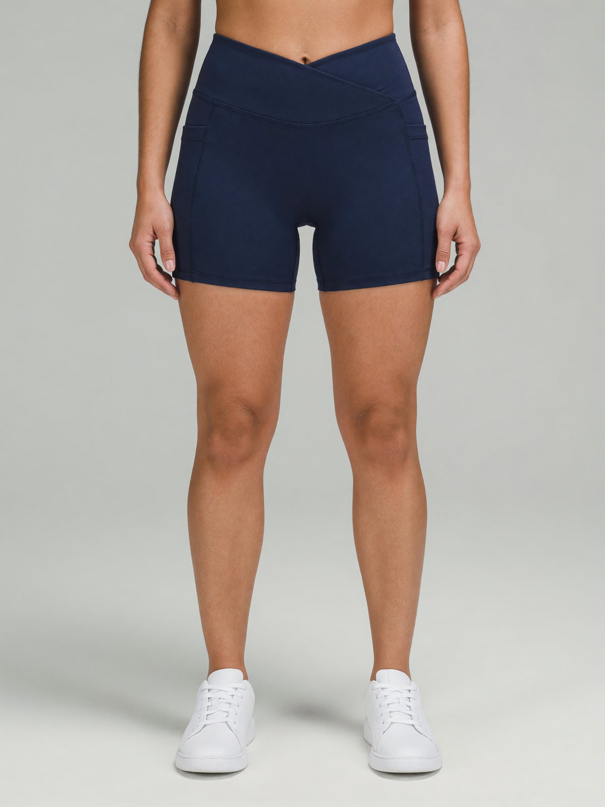High-Rise Pocket Short in Navy Blue, worn, front