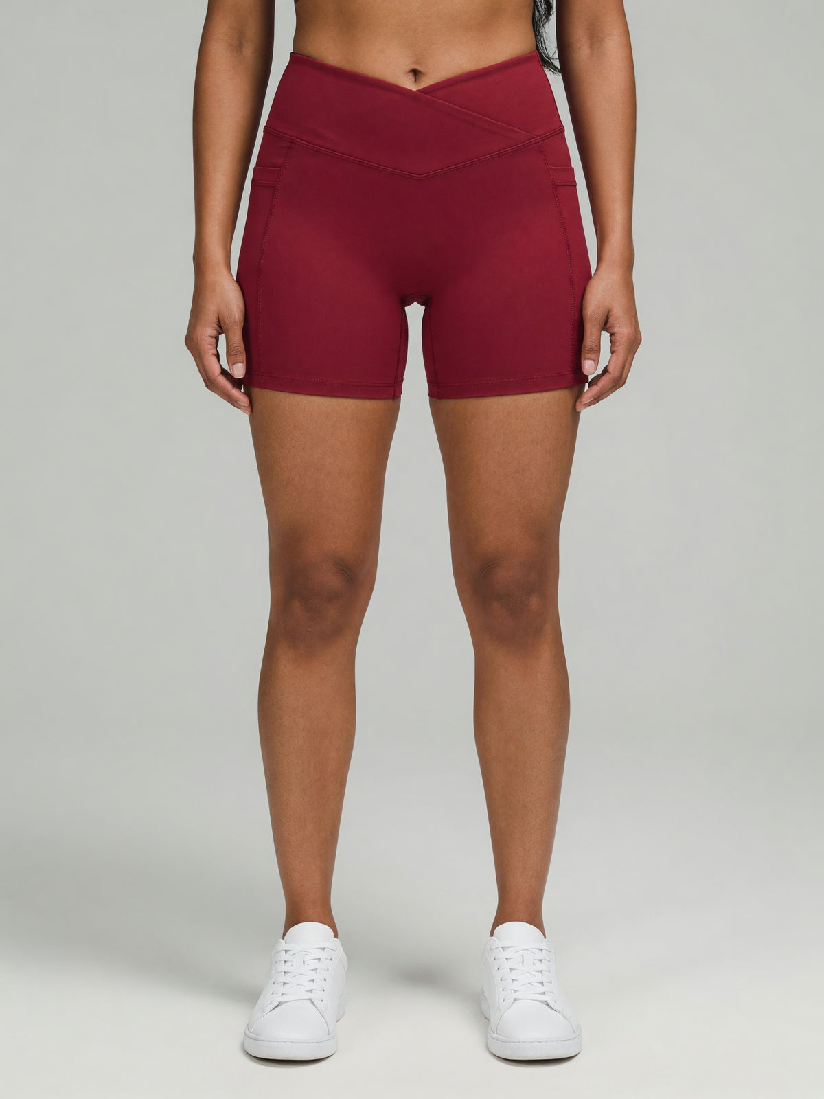 High-Rise Pocket Short in Red, worn, front