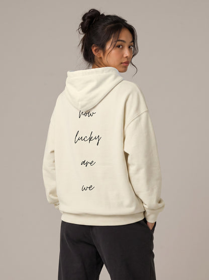 How Lucky Are We Hoodie in Bone, worn, back, second model