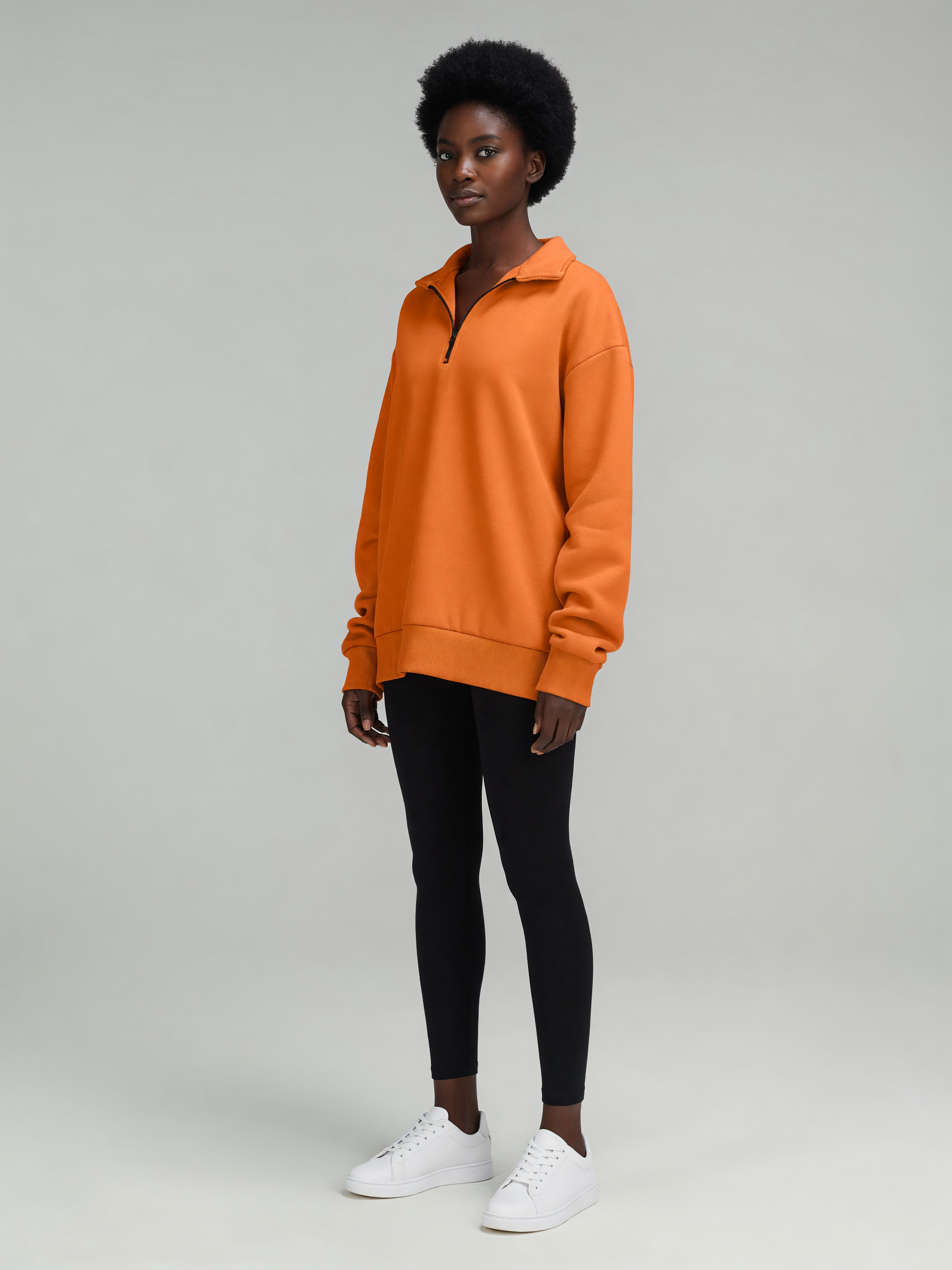 Oversized Half-Zip Pullover worn by a model, three-quarter view
