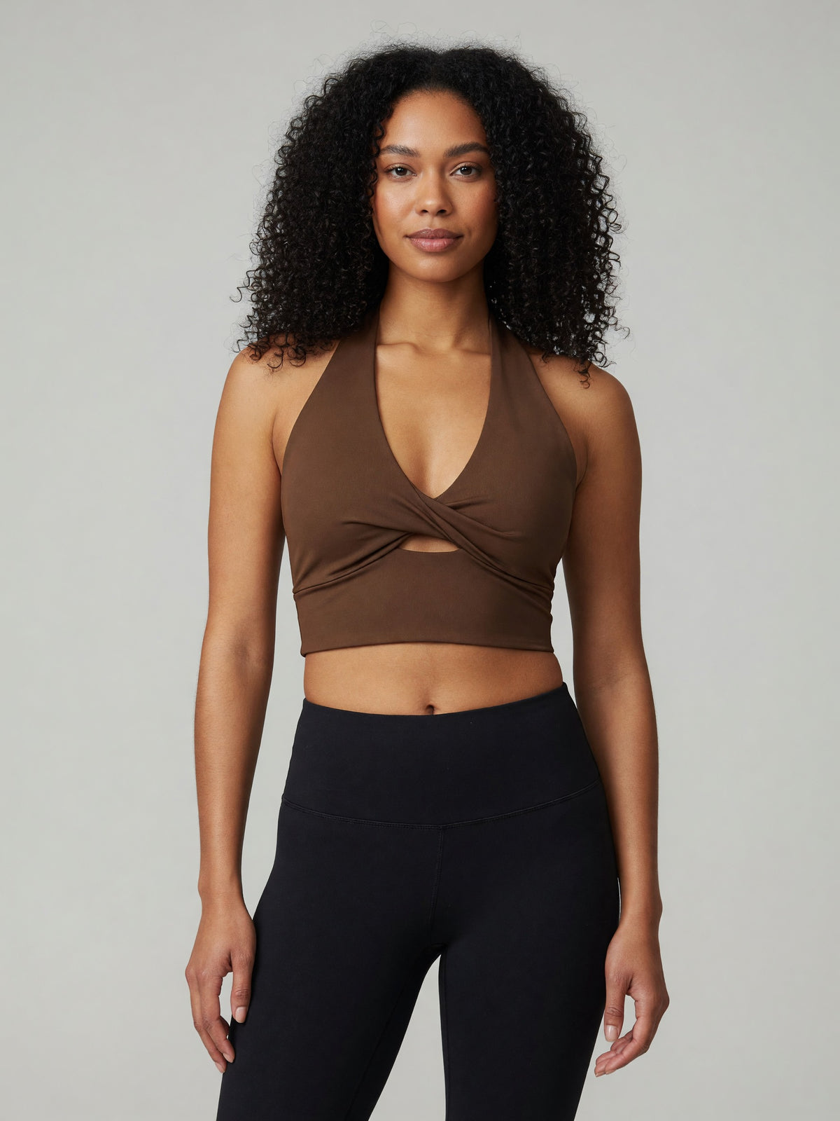 Pleated Halter Sports Bra in Brown, worn, front
