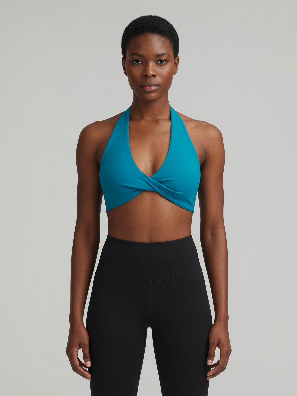 Pleated Halter Sports Bra in Peacock Blue, worn, front
