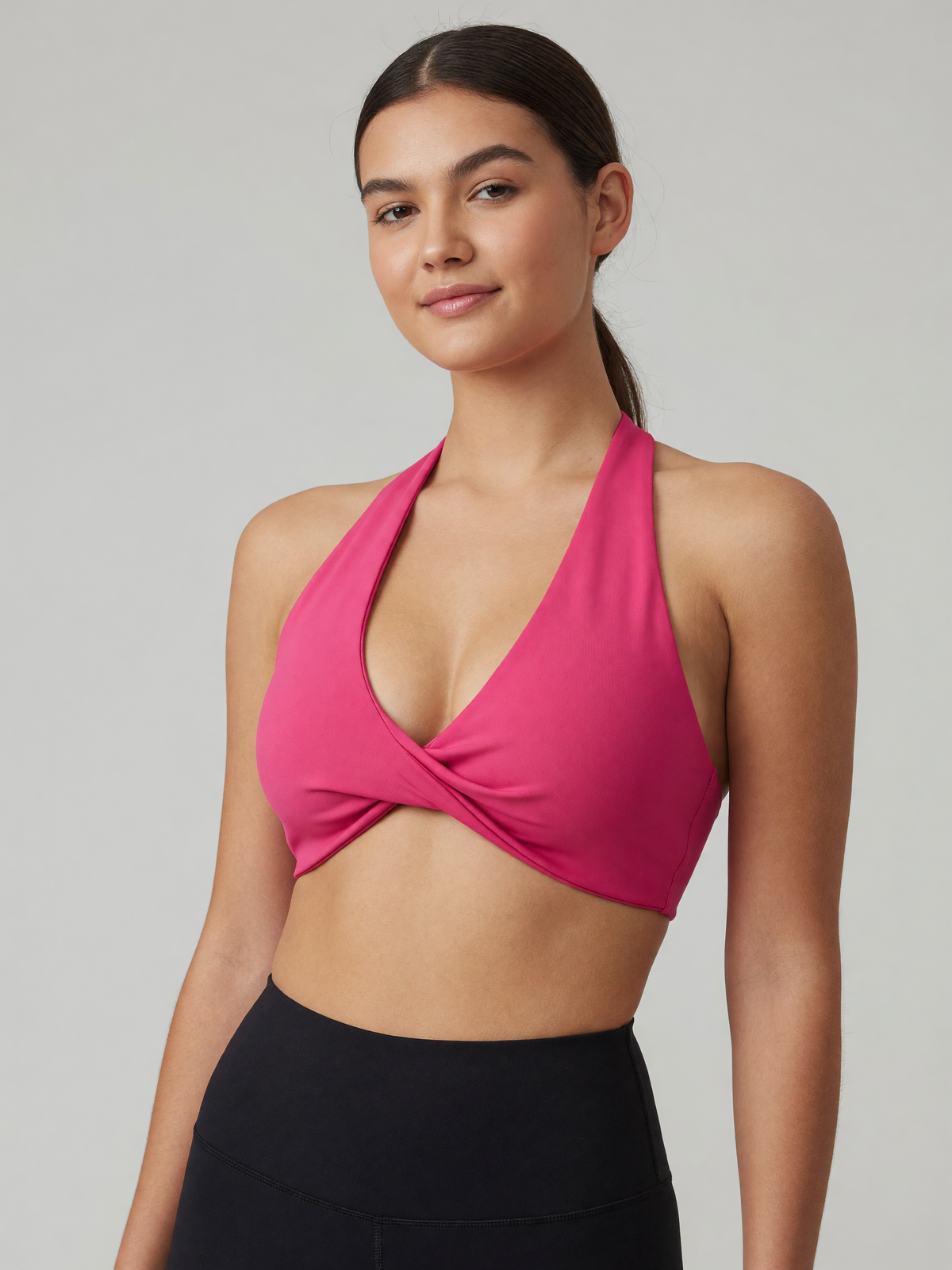 Pleated Halter Sports Bra in Rose Red, worn, three-quarter