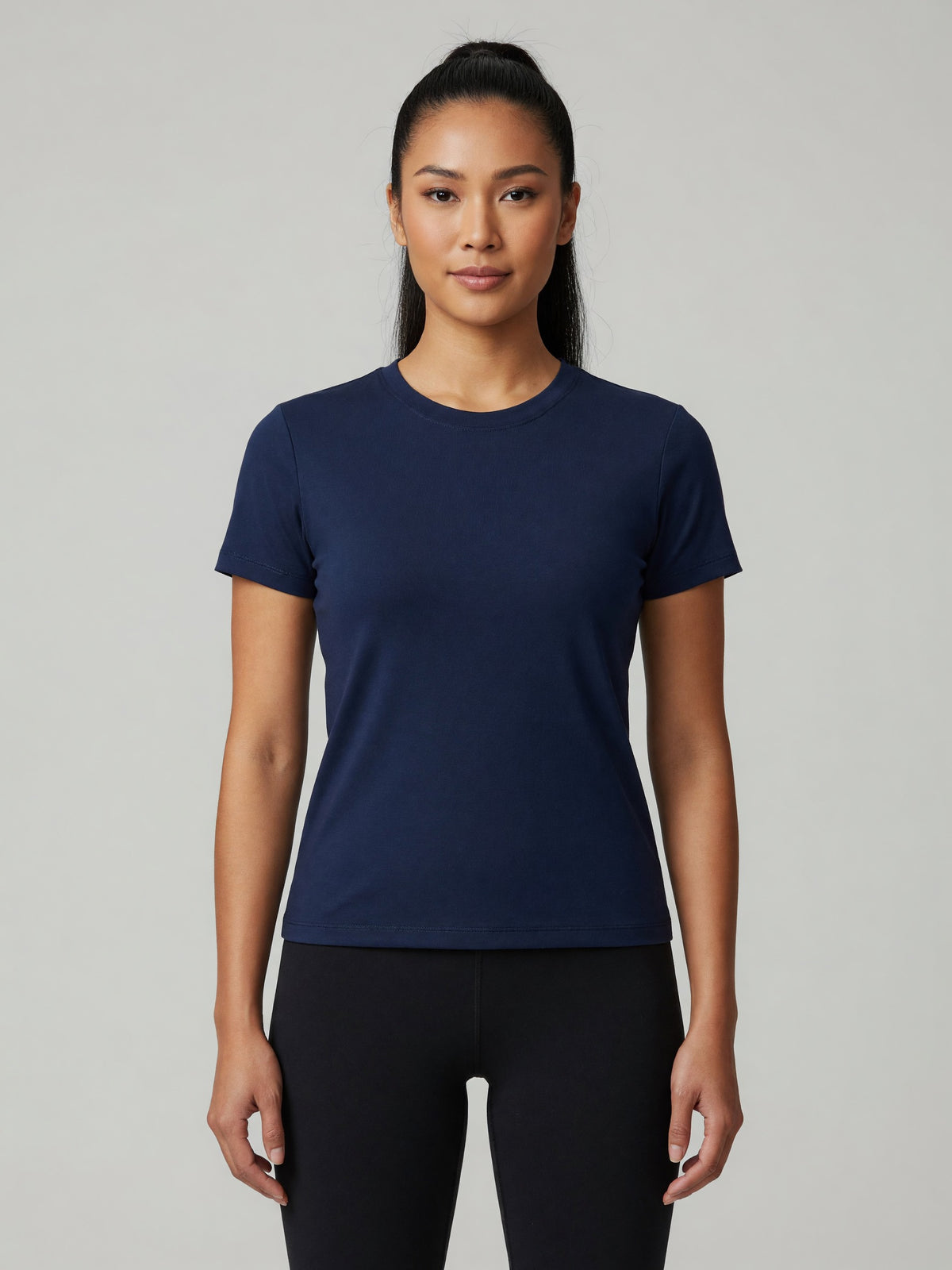 Slim Crewneck Tee in Navy Blue, worn, front