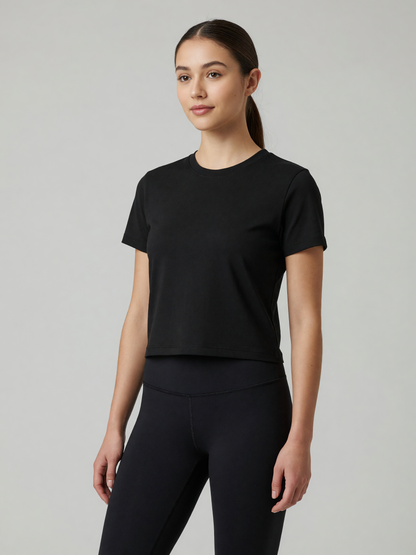 Slim Crewneck Tee in Black, worn, three-quarter