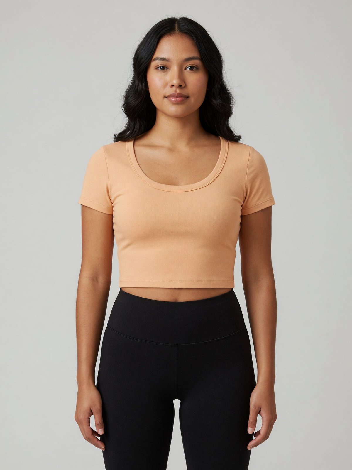 Slim Crop Tee in Apricot, worn, front