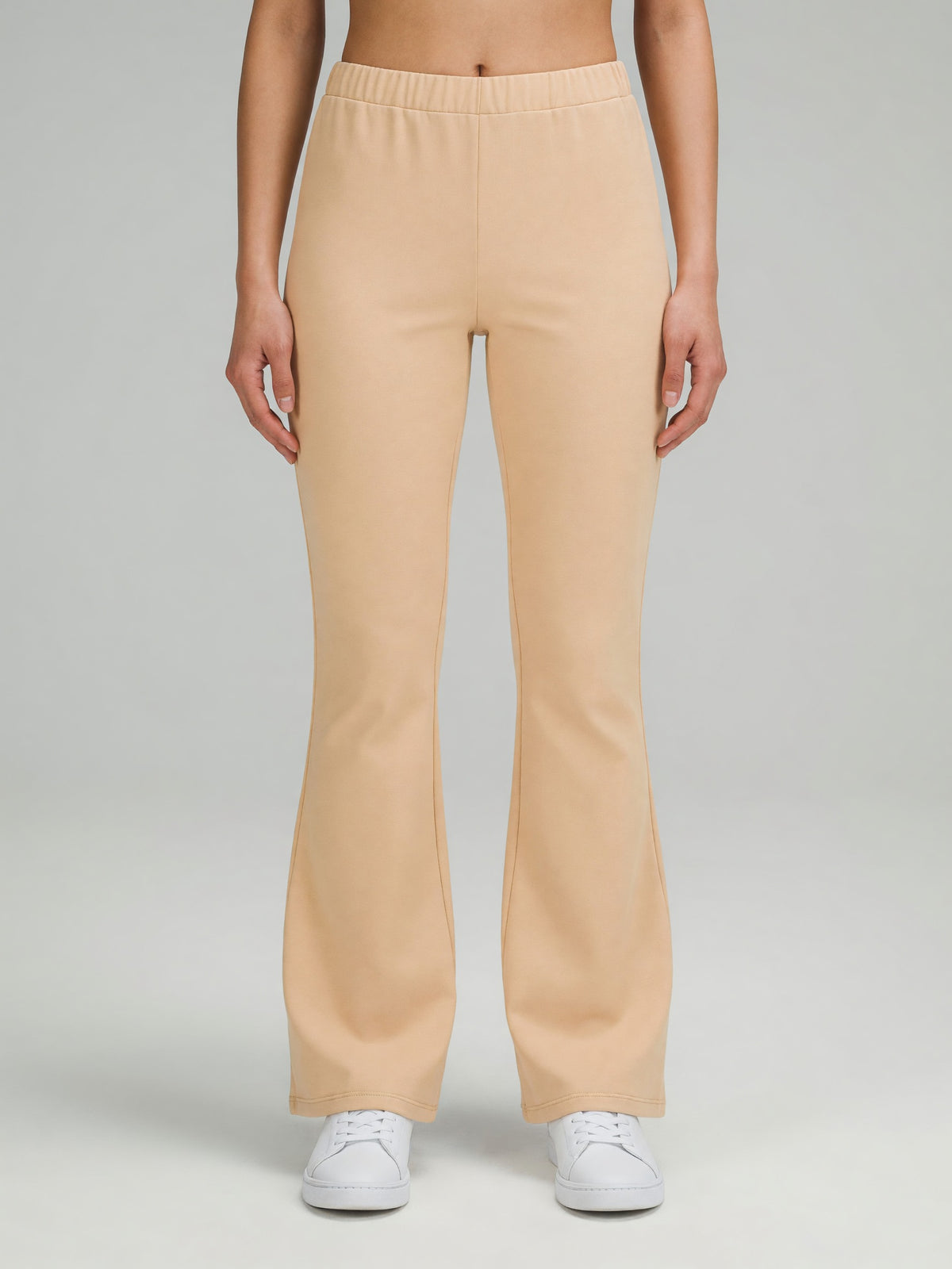 Slim Flare Sweatpant in Light Apricot, worn, front