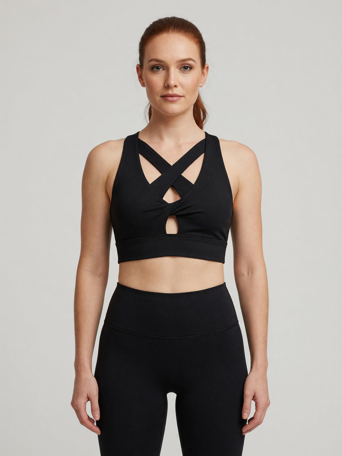 Twist-Front Sports Bra in Black, worn, front