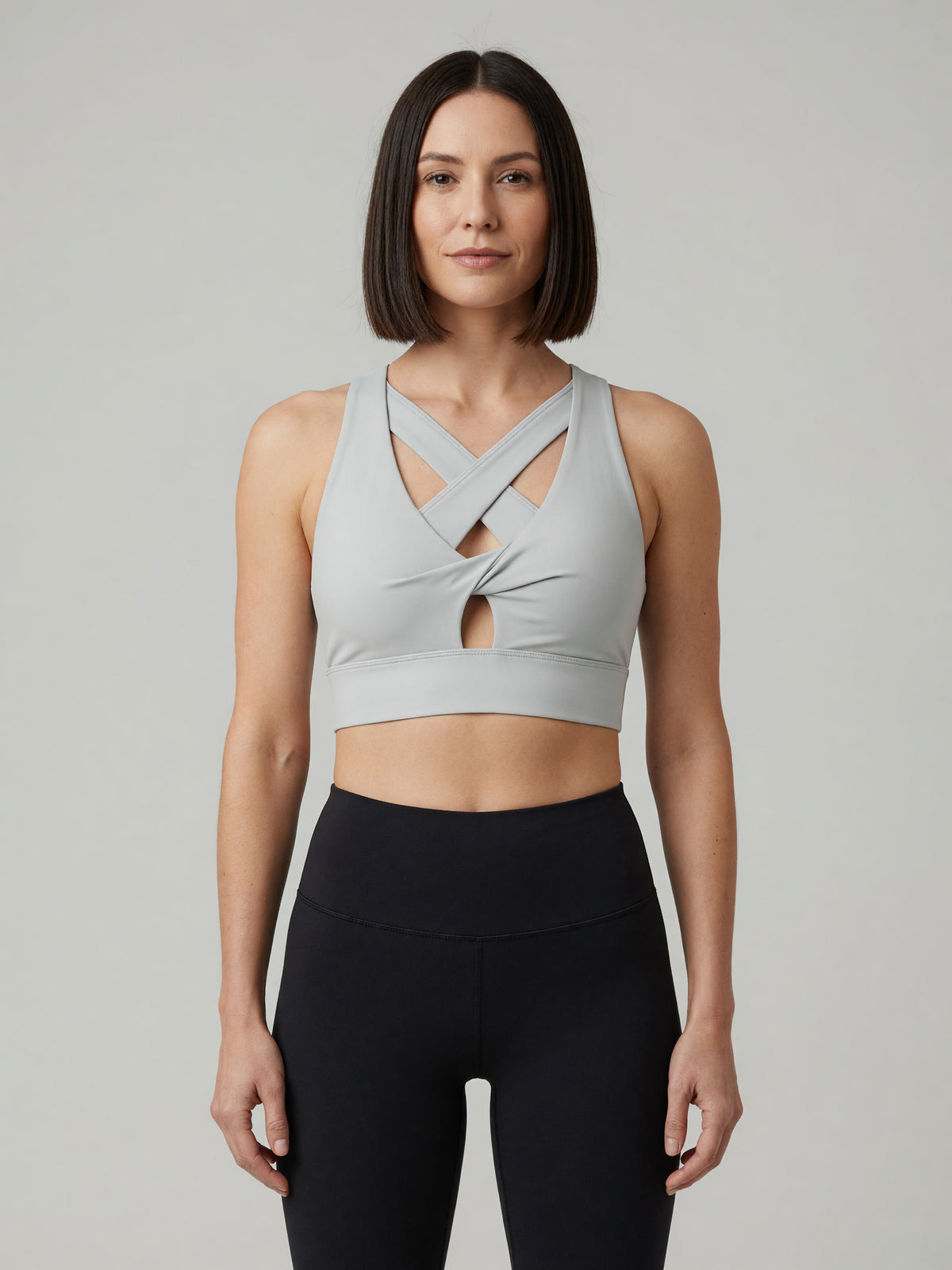 Twist-Front Sports Bra in Light Gray, worn, front