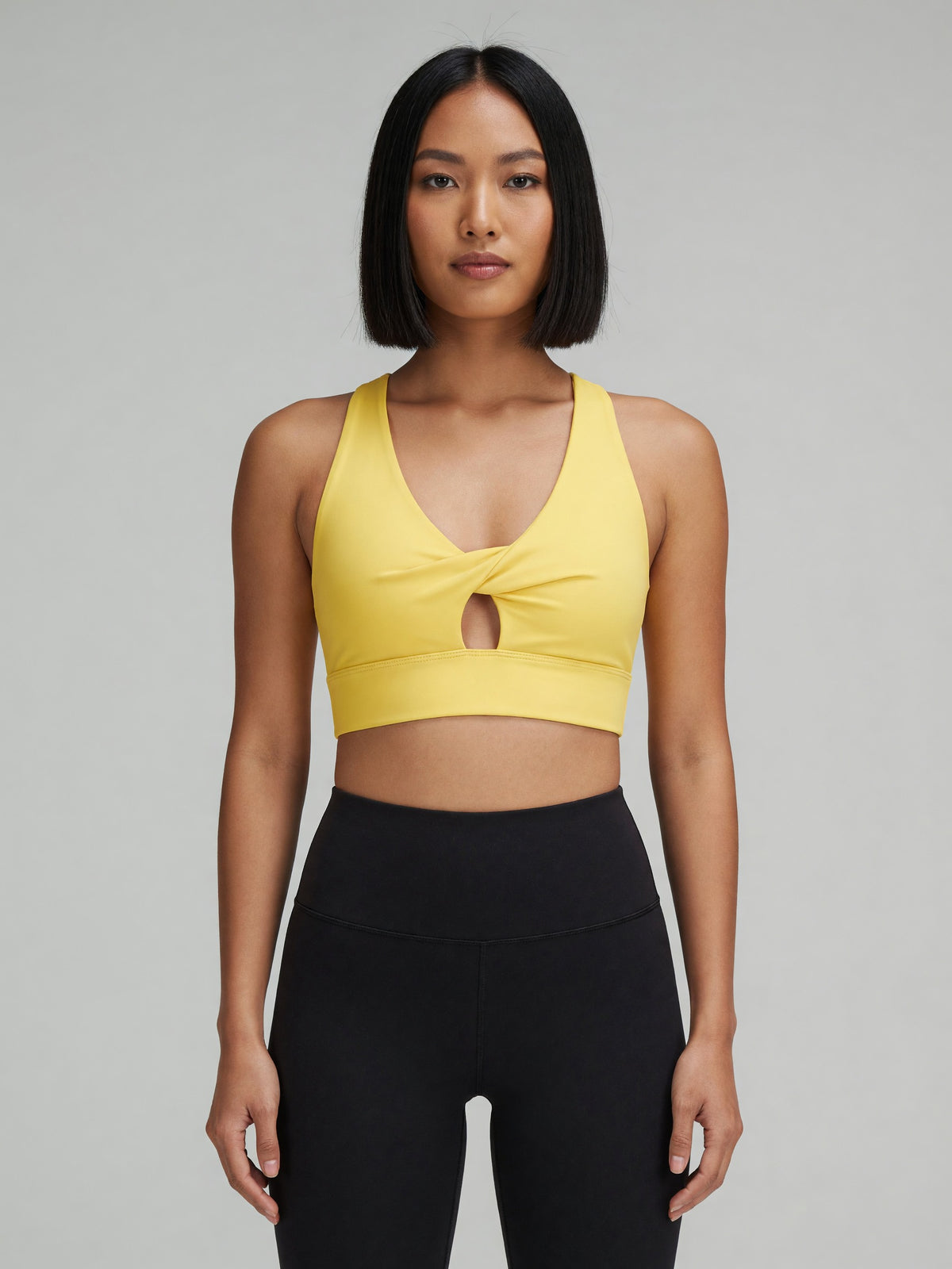 Twist-Front Sports Bra in Yellow, worn, front